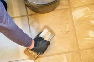 Beaverton tiler applying grout